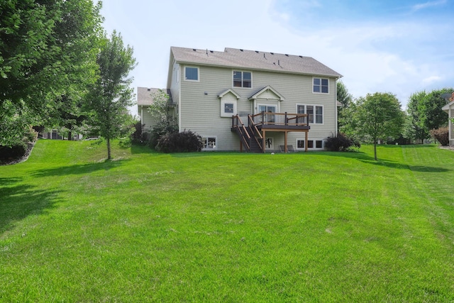 1730 Deephaven Dr, Woodbury, MN 55129 - rear view of property featuring stairway, a deck, and a lawn