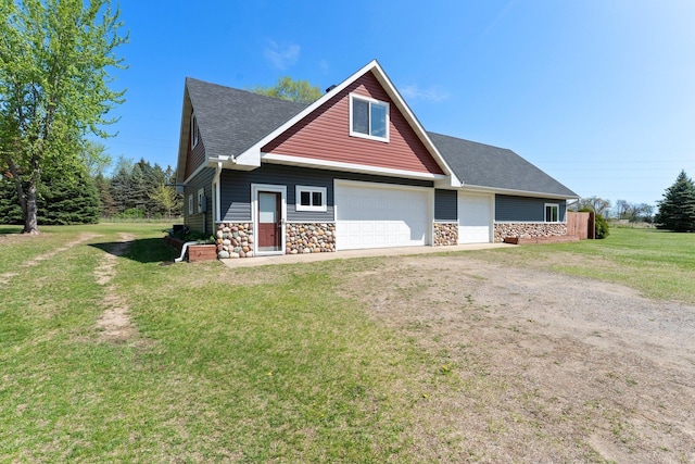 view of front facade featuring stone siding, a front yard, roof with shingles, and dirt driveway