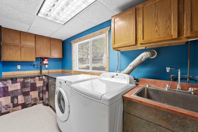 laundry room featuring cabinet space and washing machine and clothes dryer
