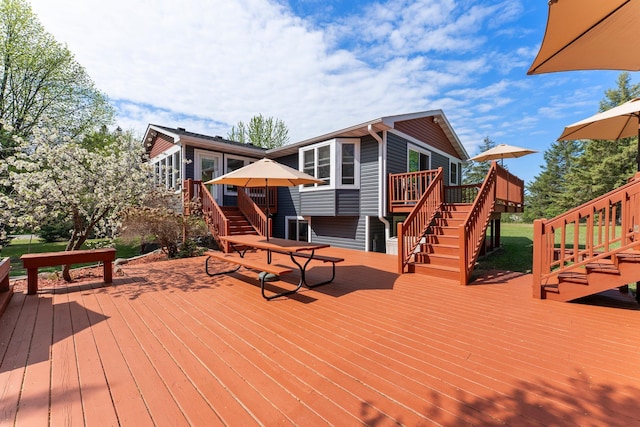 wooden deck featuring stairway