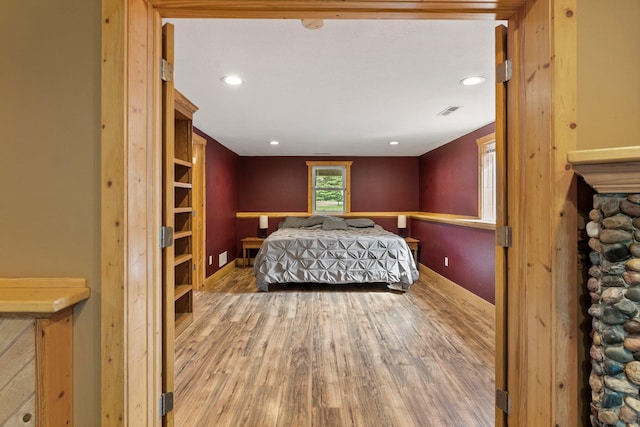7715 217th Ave NE, Linwood Twp, MN 55092 - bedroom with wood finished floors and recessed lighting