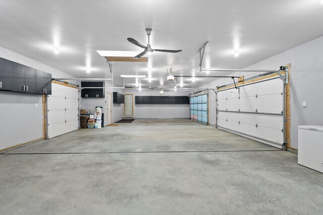 7715 217th Ave NE, Linwood Twp, MN 55092 - garage with ceiling fan and fridge
