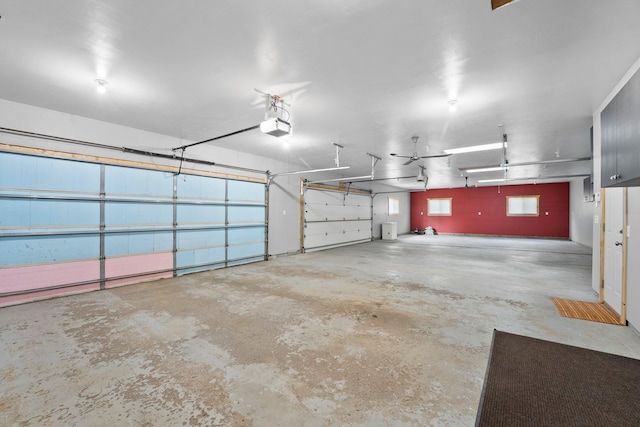 7715 217th Ave NE, Linwood Twp, MN 55092 - garage featuring a garage door opener