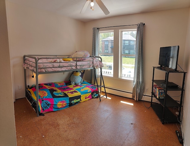 bedroom featuring tile patterned floors, a baseboard radiator, and ceiling fan