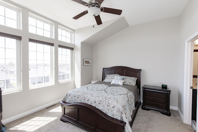 3313 5th Way E Unit B, West Fargo, ND 58078 - bedroom featuring light carpet, a ceiling fan, baseboards, and vaulted ceiling