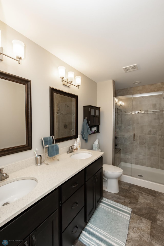 3313 5th Way E Unit B, West Fargo, ND 58078 - full bathroom with a stall shower, double vanity, and toilet
