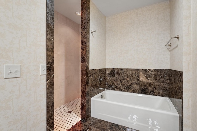 10420 Bluff Cir, Chaska, MN 55318 - full bathroom with a bath, a tile shower, tile walls, and marble finish floors