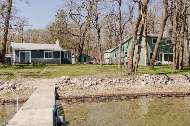 20841AND20850 Leona Beach Rd, Erie Twp, MN 56578 - view of green lawn with a water view