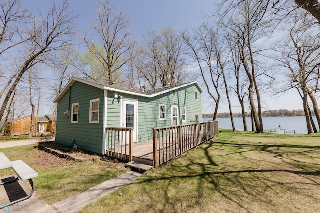 20841AND20850 Leona Beach Rd, Erie Twp, MN 56578 - view of front of home featuring a deck with water view and a front yard