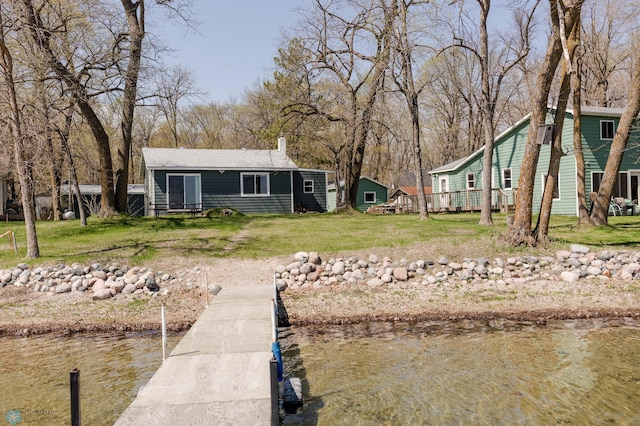 20841AND20850 Leona Beach Rd, Erie Twp, MN 56578 - dock area featuring a lawn and a water view