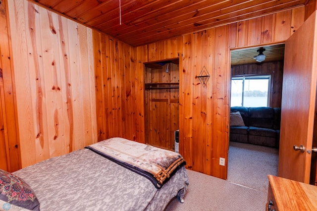 20841AND20850 Leona Beach Rd, Erie Twp, MN 56578 - bedroom with carpet floors, wood ceiling, and wood walls