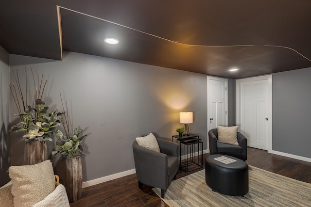 615 Vine St, Hudson, WI 54016 - living area with wood finished floors, baseboards, and recessed lighting