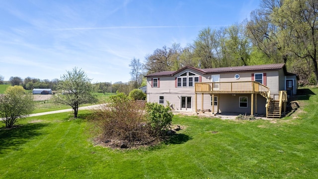 36308 Edgewood Rd, Harmony, MN 55939 - rear view of house with a deck, stairs, a yard, and a patio