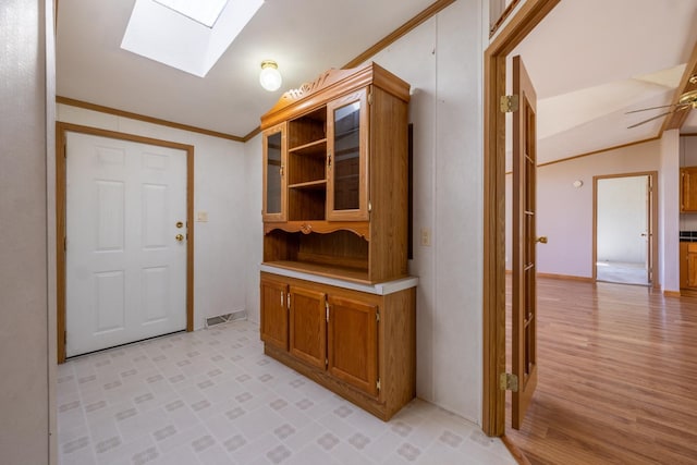 36308 Edgewood Rd, Harmony, MN 55939 - hall with a skylight, lofted ceiling, and ornamental molding