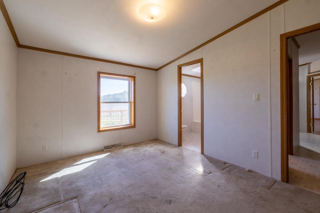 36308 Edgewood Rd, Harmony, MN 55939 - spare room featuring ornamental molding, carpet floors, and vaulted ceiling