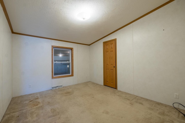 36308 Edgewood Rd, Harmony, MN 55939 - carpeted empty room with ornamental molding, vaulted ceiling, and a textured ceiling