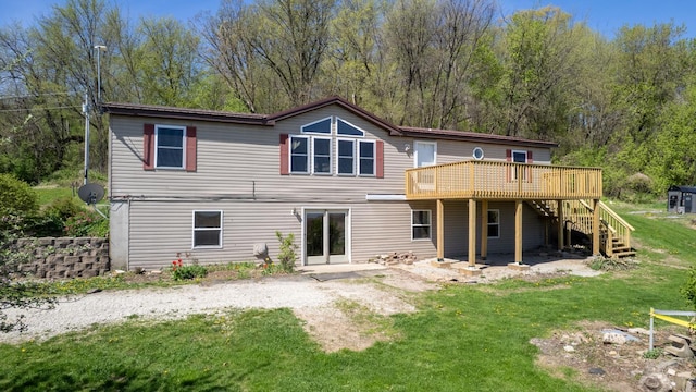 36308 Edgewood Rd, Harmony, MN 55939 - rear view of property featuring a wooden deck, stairway, and a lawn