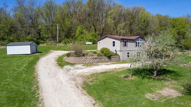 36308 Edgewood Rd, Harmony, MN 55939 - view of side of property featuring driveway and a lawn