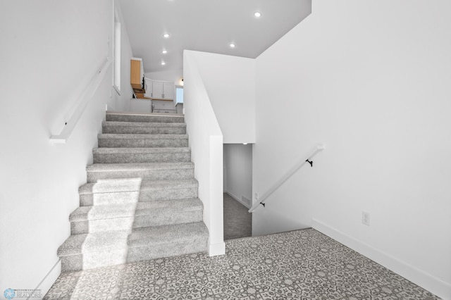 7279 26th St S, Fargo, ND 58104 - stairway featuring recessed lighting and baseboards