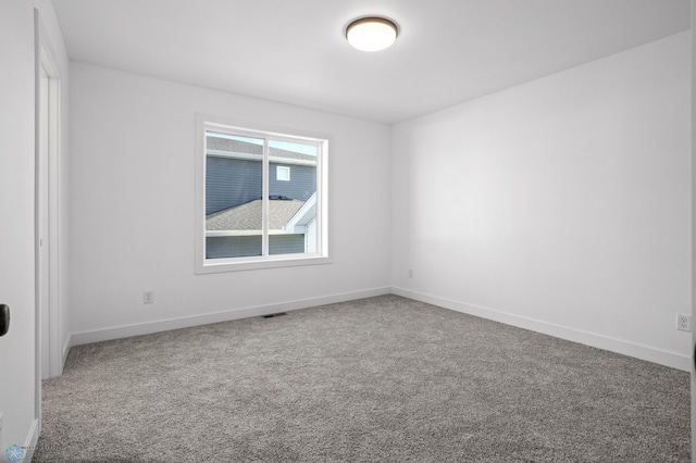 7279 26th St S, Fargo, ND 58104 - spare room with carpet floors and baseboards
