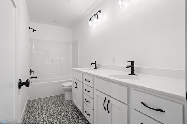 7279 26th St S, Fargo, ND 58104 - bathroom with double vanity, toilet, bathing tub / shower combination, and tile patterned floors