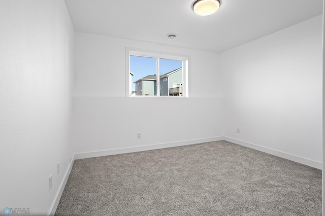 7279 26th St S, Fargo, ND 58104 - carpeted empty room featuring baseboards