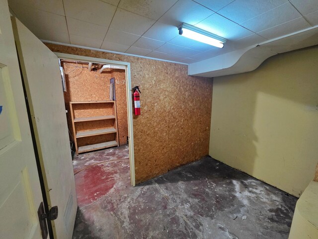642 6th Ave, Calumet, MN 55716 - finished basement featuring a paneled ceiling
