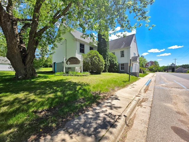 642 6th Ave, Calumet, MN 55716 - view of front of home with a front yard