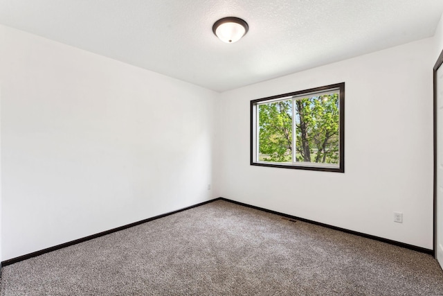 1094 7th St E, Saint Paul, MN 55106 - empty room with carpet floors and baseboards