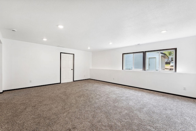 1094 7th St E, Saint Paul, MN 55106 - carpeted spare room featuring recessed lighting and baseboards