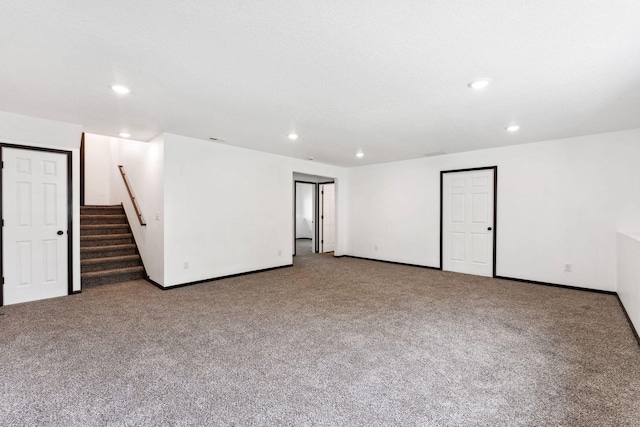 1094 7th St E, Saint Paul, MN 55106 - finished basement featuring recessed lighting, carpet flooring, stairway, and baseboards