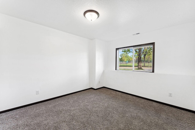 1094 7th St E, Saint Paul, MN 55106 - unfurnished room featuring carpet floors and baseboards