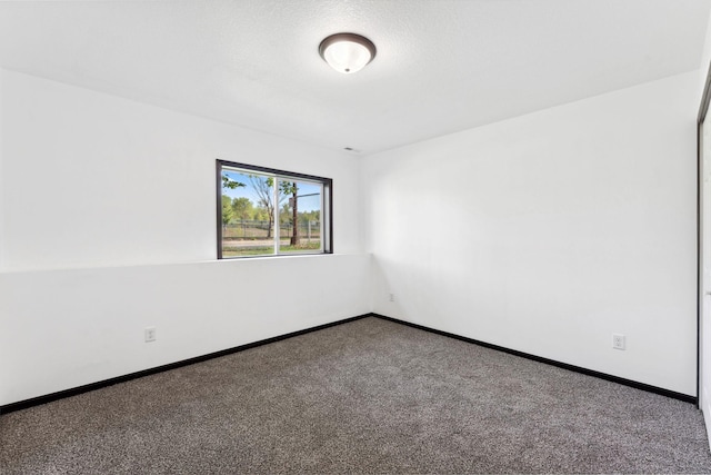 1094 7th St E, Saint Paul, MN 55106 - carpeted spare room with baseboards