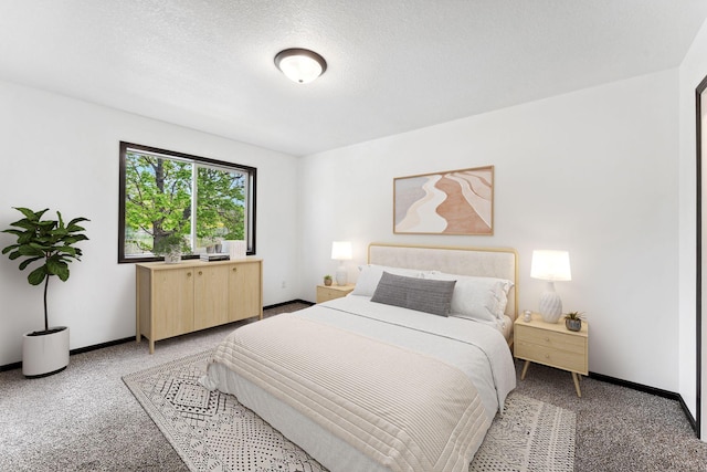 1094 7th St E, Saint Paul, MN 55106 - bedroom featuring light carpet, baseboards, and a textured ceiling