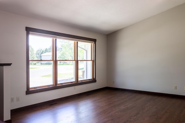 1377 Parkview Dr, New Richmond, WI 54017 - spare room with dark wood-style floors and baseboards