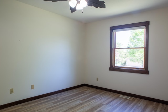 1377 Parkview Dr, New Richmond, WI 54017 - unfurnished room with light wood-style flooring, baseboards, and ceiling fan