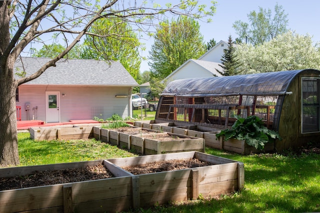 1377 Parkview Dr, New Richmond, WI 54017 - view of green lawn featuring a garden