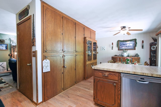 26163 170th St, New Richland, MN 56072 - kitchen featuring stainless steel dishwasher, a ceiling fan, light wood-style flooring, and light countertops