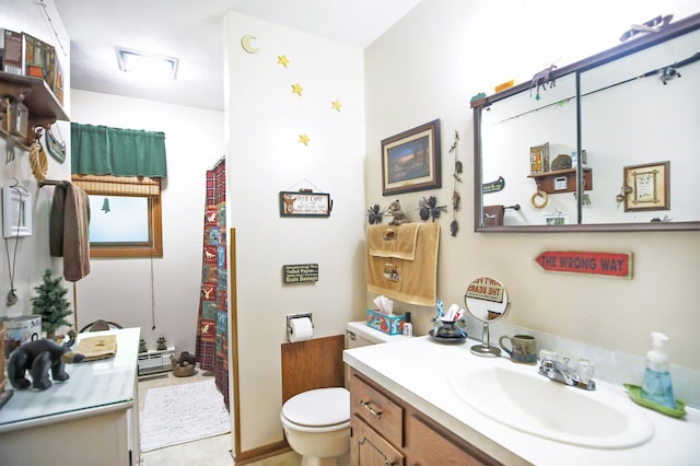 26163 170th St, New Richland, MN 56072 - full bathroom with toilet, vanity, curtained shower, and a baseboard radiator