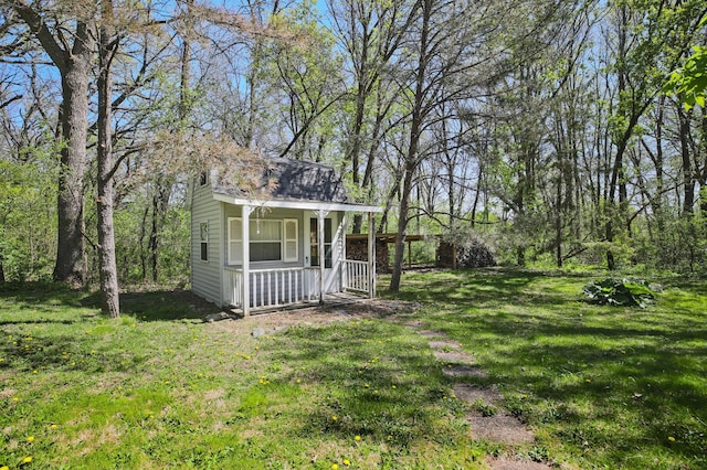 26163 170th St, New Richland, MN 56072 - view of green lawn featuring a porch