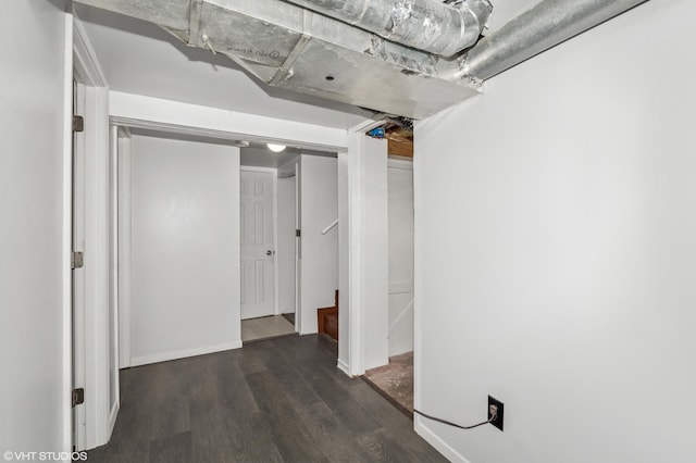 basement with wood finished floors and baseboards