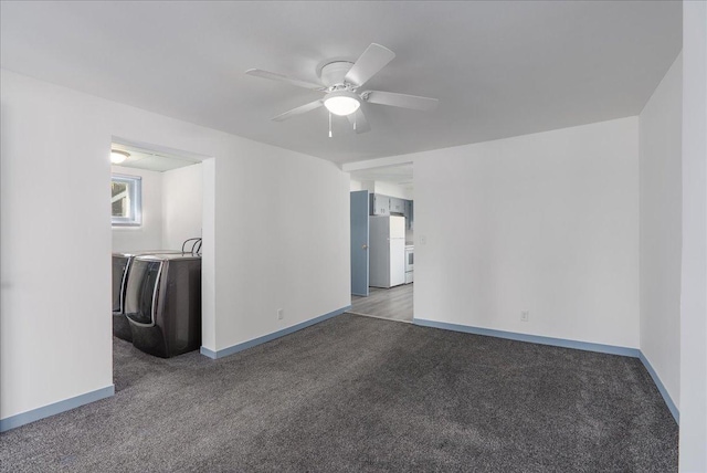 231 High St, New Richmond, WI 54017 - carpeted spare room featuring independent washer and dryer, ceiling fan, and baseboards