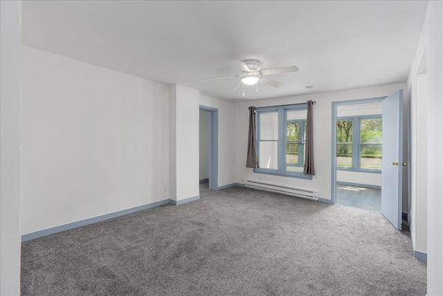 231 High St, New Richmond, WI 54017 - empty room with a baseboard radiator, carpet, ceiling fan, and baseboards