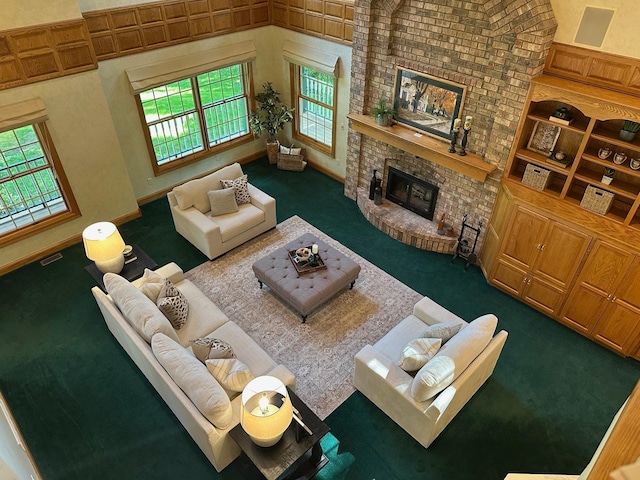 2 Pleasant Lake Rd, North Oaks, MN 55127 - carpeted living room featuring a fireplace