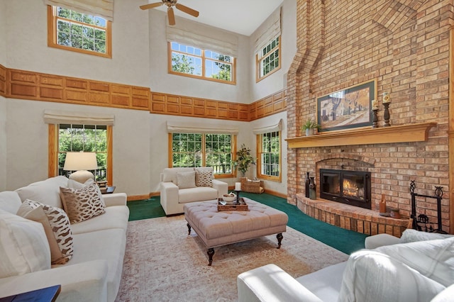 2 Pleasant Lake Rd, North Oaks, MN 55127 - living area with a high ceiling, ceiling fan, and a fireplace