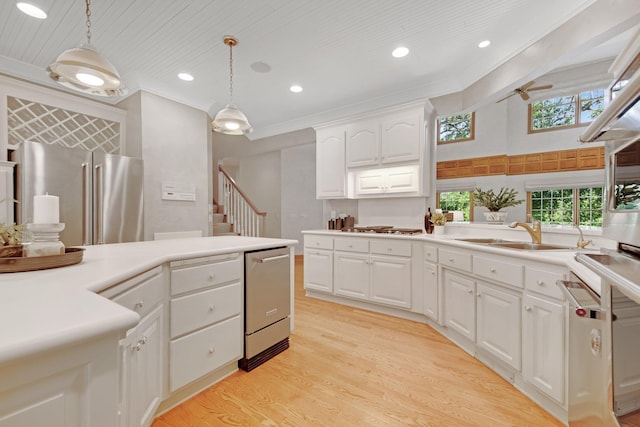 2 Pleasant Lake Rd, North Oaks, MN 55127 - kitchen with stainless steel appliances, ornamental molding, decorative light fixtures, white cabinetry, and recessed lighting