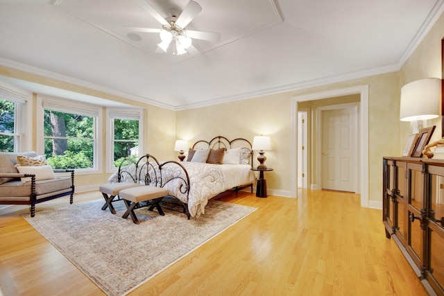 2 Pleasant Lake Rd, North Oaks, MN 55127 - bedroom with multiple windows, light wood-type flooring, ornamental molding, and a ceiling fan