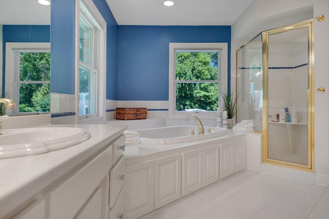 2 Pleasant Lake Rd, North Oaks, MN 55127 - bathroom with vanity, a shower stall, a bath, tile patterned flooring, and recessed lighting