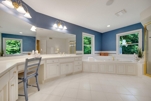 2 Pleasant Lake Rd, North Oaks, MN 55127 - bathroom with a garden tub, vanity, a stall shower, and tile patterned flooring