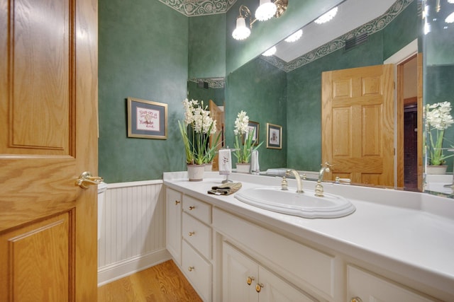 2 Pleasant Lake Rd, North Oaks, MN 55127 - bathroom with vanity and wood finished floors
